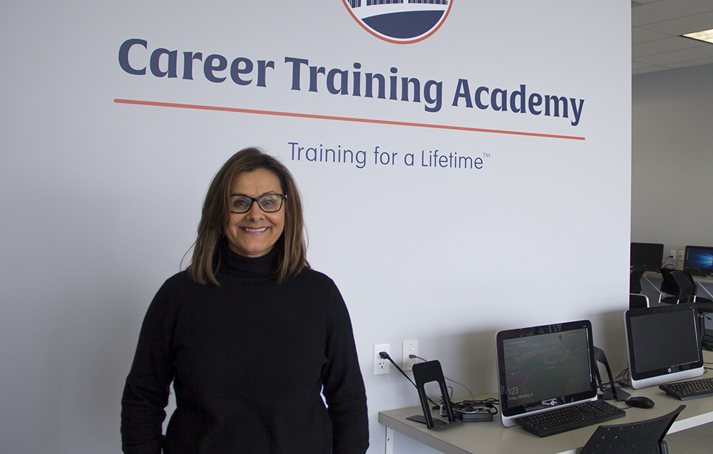 Pictured is alumna Kimberly Rassau, Ed.D., president and CEO of Career Training Academy